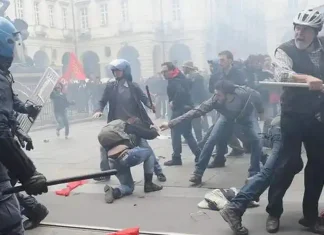 Первомайский праздник в Турине прошла манифестация трудящихся Cтычки с полицией 1 мая в Турине Видео и фото