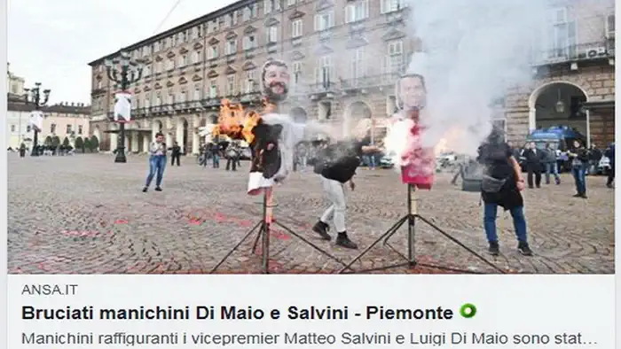 В Турине на главной площади были сожжены манекены Ди Майо и Сальвини