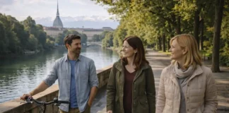 Парки Турина: полный гид по зелёным местам города и окрестностей Парки Турина - прогулки у реки По и панорамы города зелёный парк в Турине, дорожка для прогулки, мягкий дневной свет, вид на город и Альпы вдали.