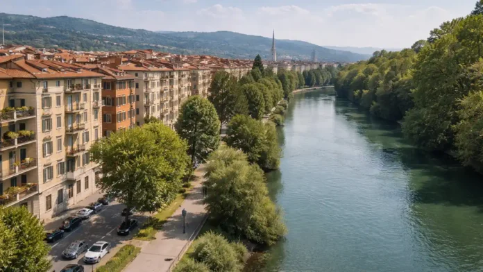 Район Regio Parco в Турине вид с высоты – дома, река По и зелёные зоны Панорамный вид на район Regio Parco в Турине с высоты: на переднем плане жилые дома и зелёные дворы, на заднем плане река По и набережная, мягкий дневной свет