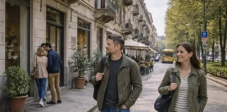 Район Аврора в Турине: стоит ли жить, снимать или покупать квартиру в 2026 году Турин, район Аврора. На переднем плане спокойная улица с типичными домами старого фонда, аккуратные фасады, несколько прохожих 30–45 лет