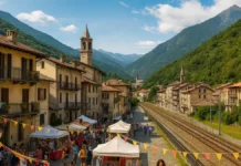 От дачников до жителей: почему Ceres в Пьемонте выбирают для жизни рядом с Турином Жизнь в Ceres Пьемонт рядом с Турином Фотореалистичный вид Ceres в долине Валь-ди-Ланцо, горы, домики и железная дорога в сторону Турина, солнечная атмосфера.